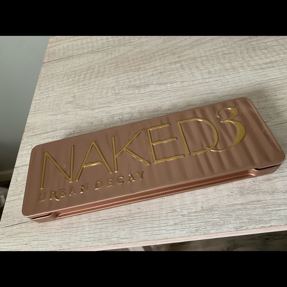 Urban decay Naked 3 eyeshadow palette. Never used